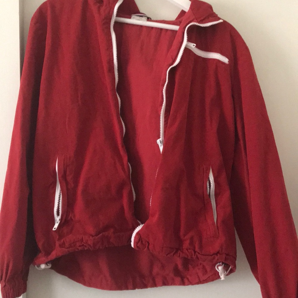 red zip up jacket